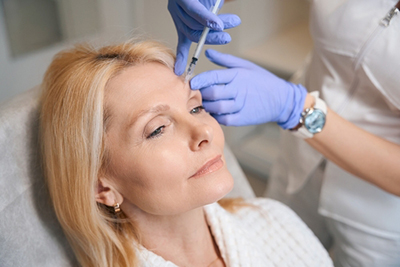 Woman in the procedure of dermal filling